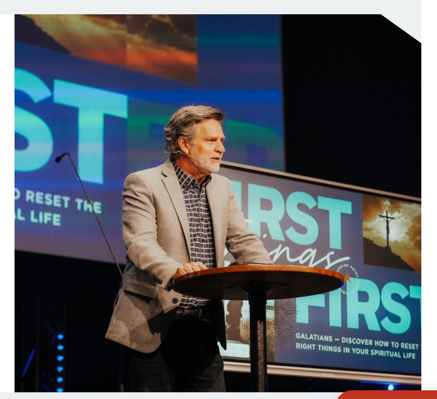 Pastor teaching from a stage podium during a sermon series